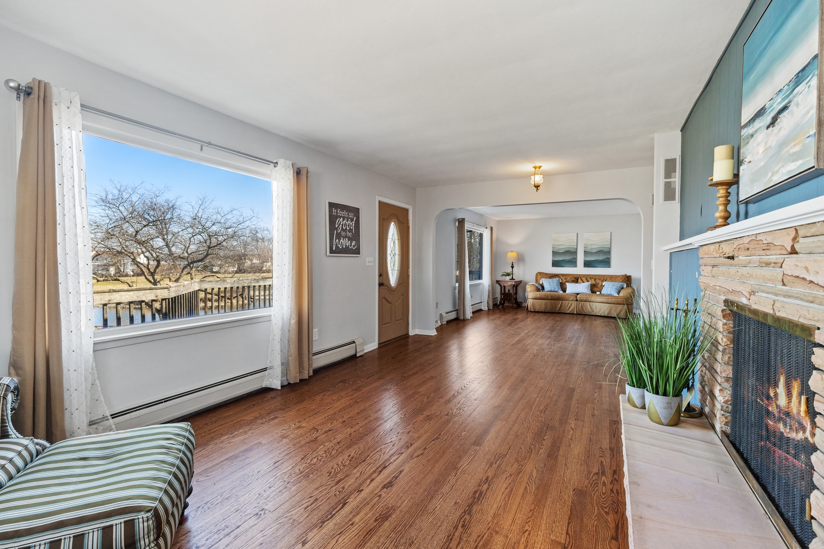 26075 Riverview Drive Antioch, IL 60002 - Photo 6 of 41 a view of a livingroom with furniture and a fireplace