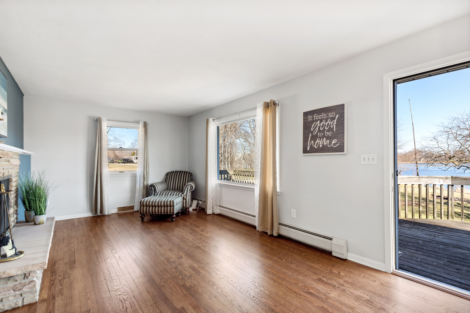 26075 Riverview Drive Antioch, IL 60002 - Photo 7 of 41 a living room with furniture and a wooden floor