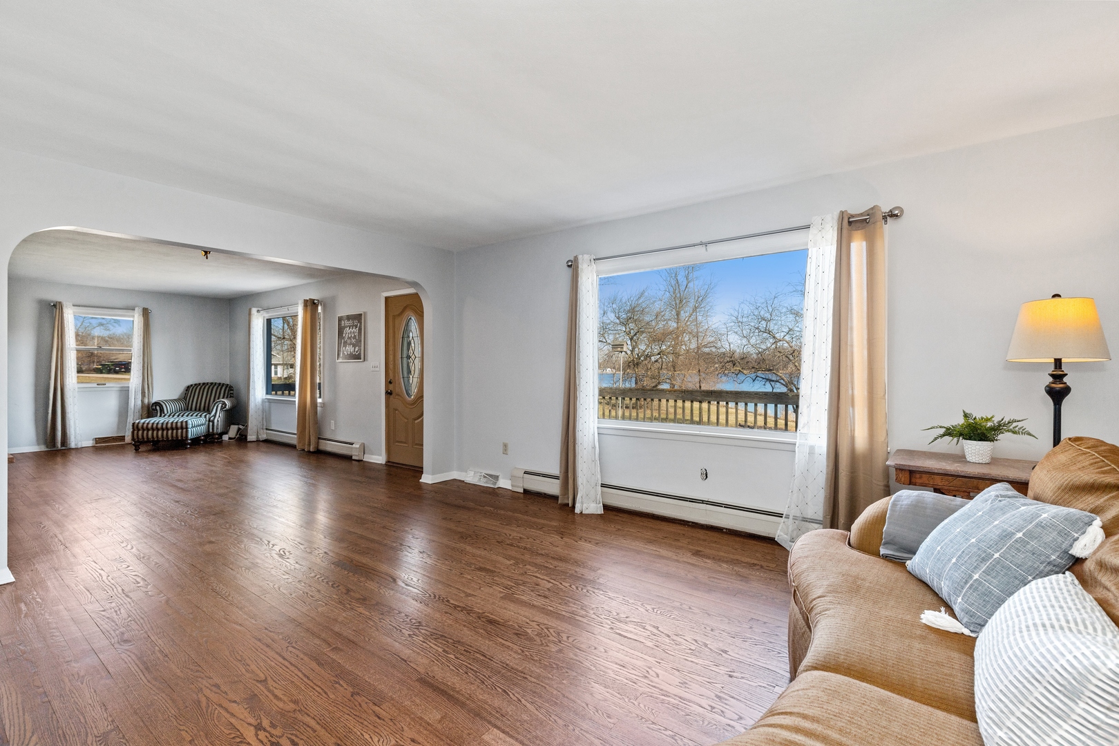 26075 Riverview Drive Antioch, IL 60002 - Photo 9 of 41 a living room with furniture and a large window