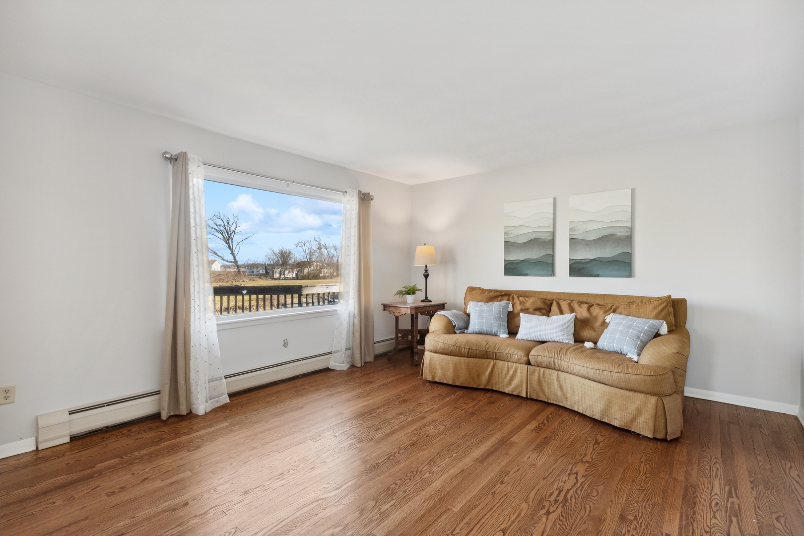 26075 Riverview Drive Antioch, IL 60002 - Photo 10 of 41 a living room with furniture and a large window
