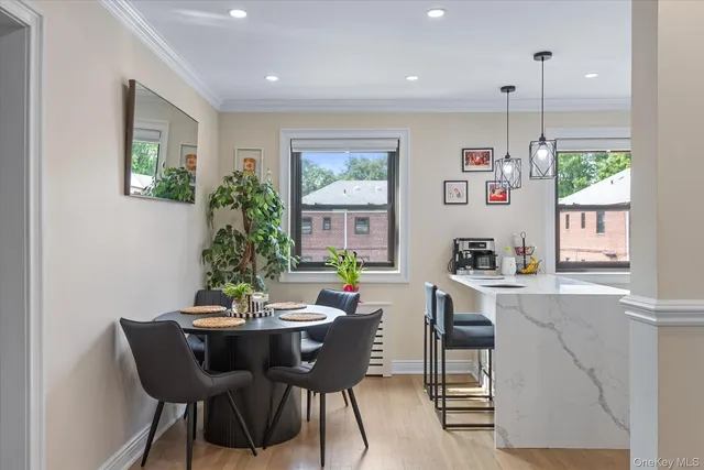 a view of a dining room with furniture window and outside view
