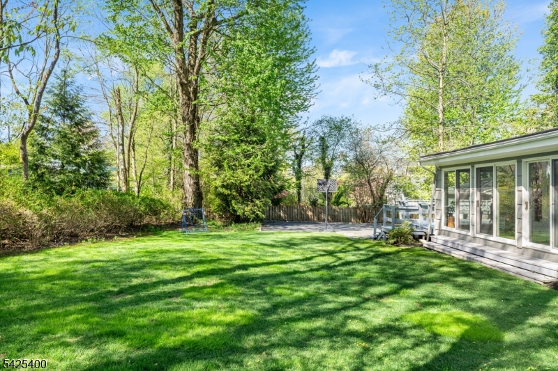 28 Spring Ridge Drive Berkeley Heights, NJ 07922 - Photo 42 of 46 a yard with trees in the background