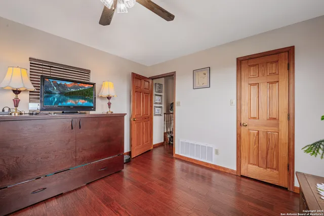 a bedroom with a bed and a dresser