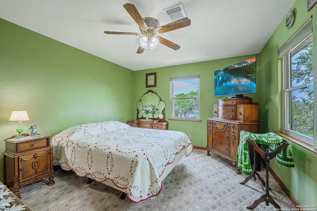 a bathroom with a sink a vanity and a mirror