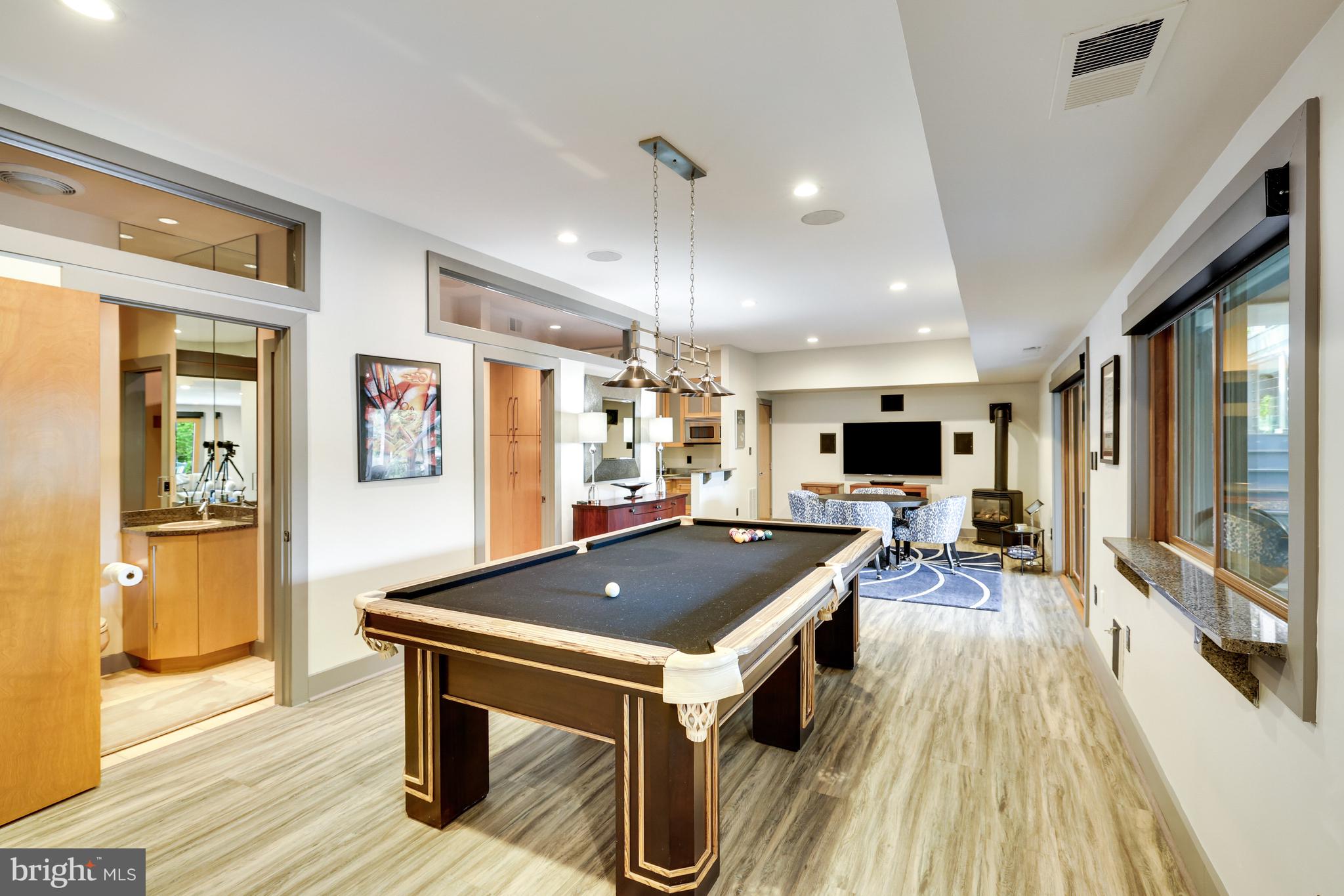 2202 Spinnaker Court Reston, VA 20191 - Photo 81 of 137 The recreation room has a new LVP flooring.