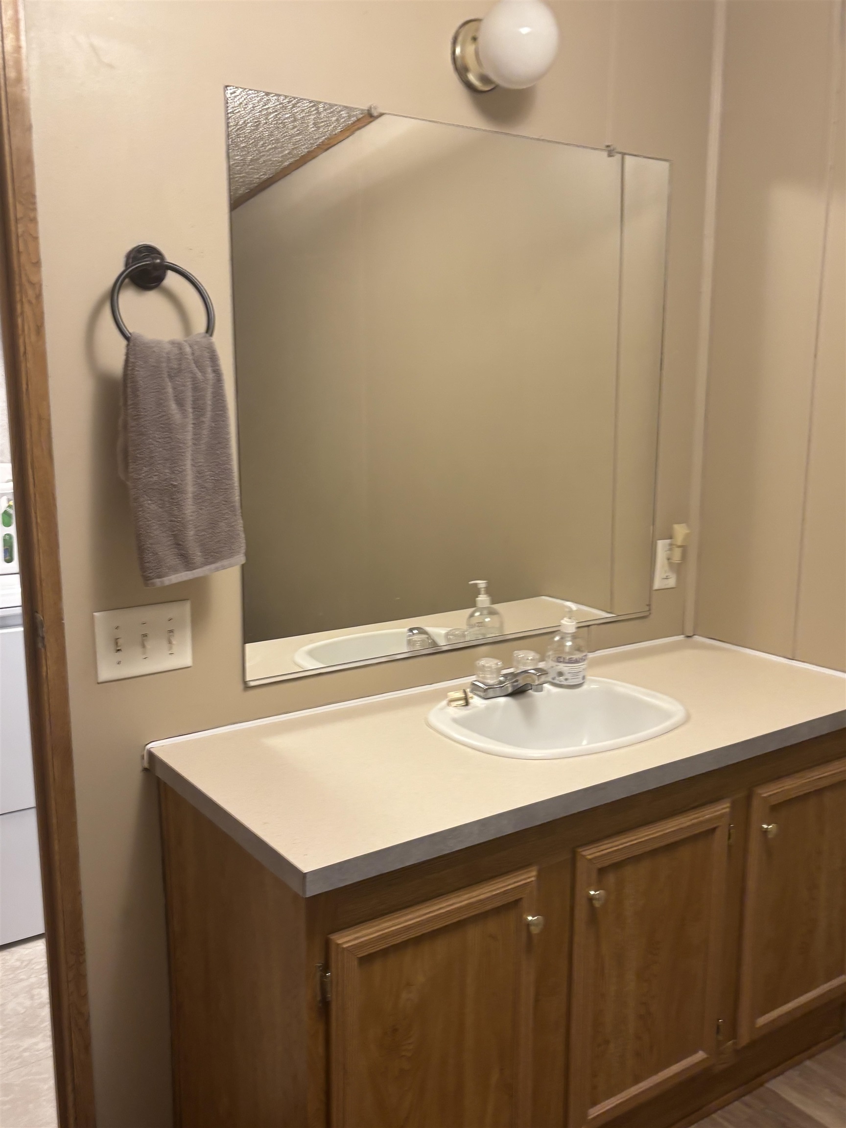 3268 E Road, Unit 90 Clifton, CO 81520 - Photo 14 of 19 a bathroom with a sink and a mirror