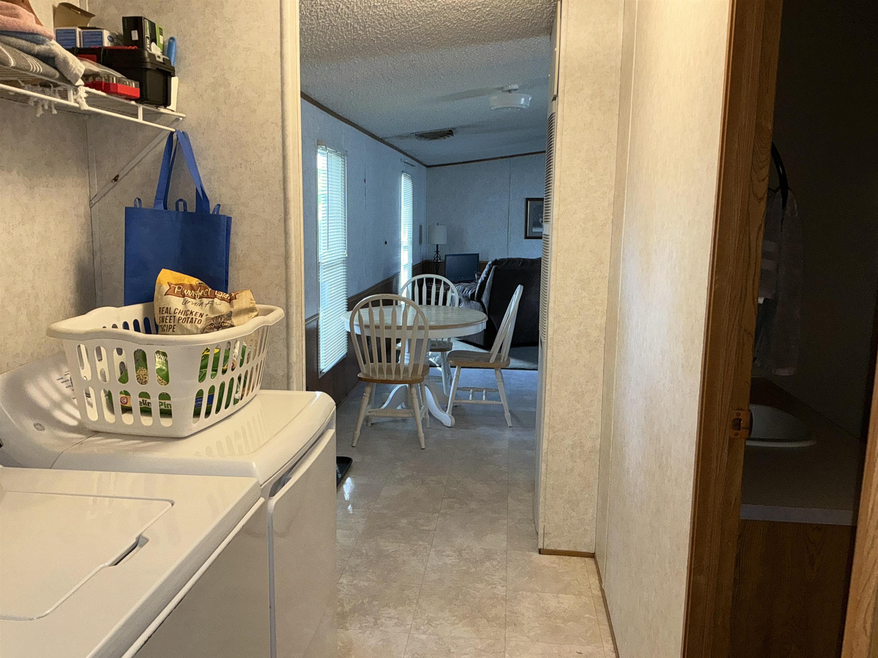 3268 E Road, Unit 90 Clifton, CO 81520 - Photo 16 of 19 a view of kitchen and dining room