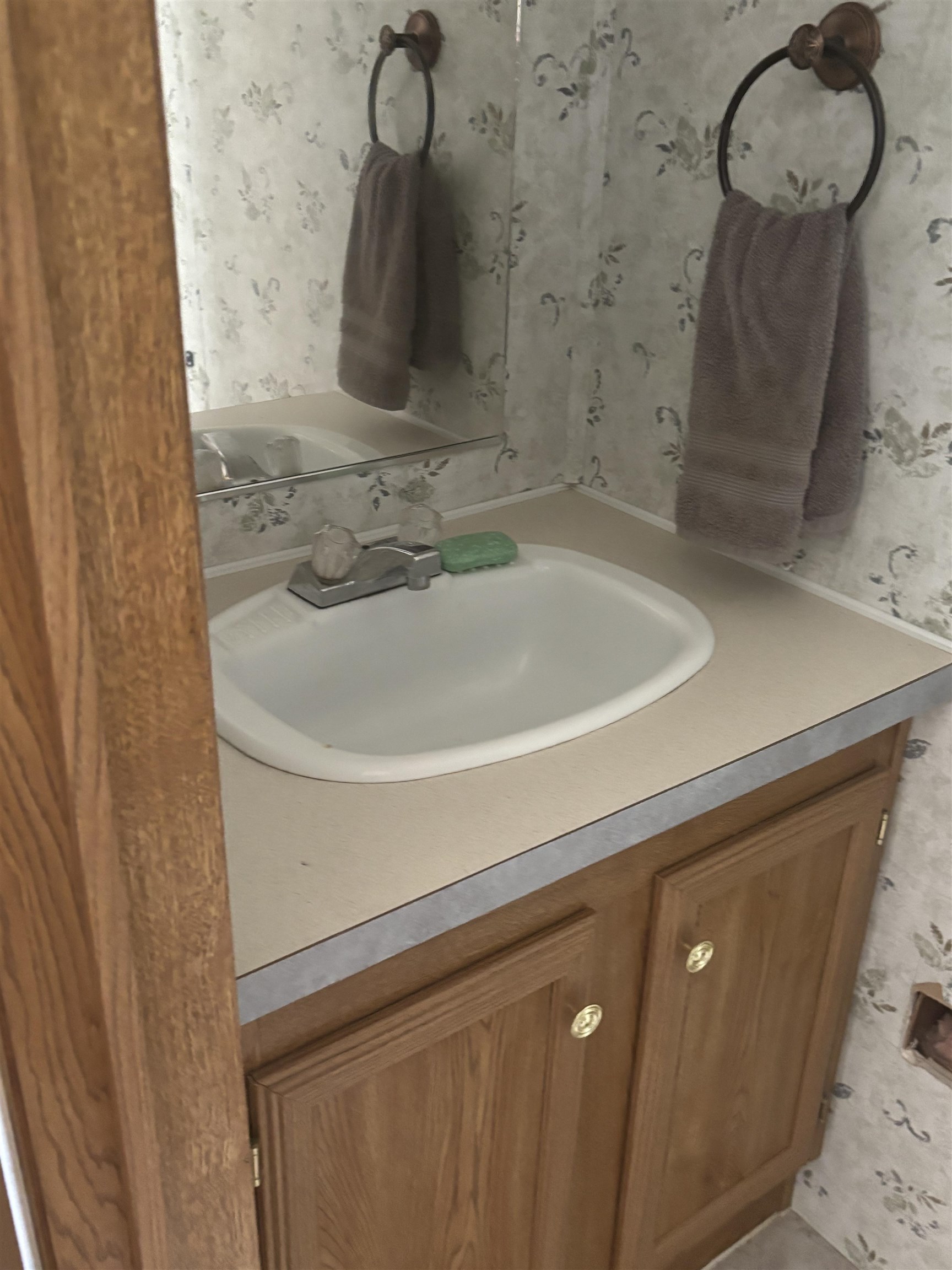 3268 E Road, Unit 90 Clifton, CO 81520 - Photo 19 of 19 a bathroom with a sink