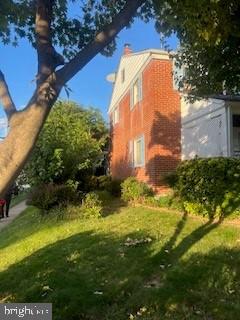 2746 Moorgate Road Baltimore, MD 21222 - Photo 2 of 14 a view of a house with a large pool