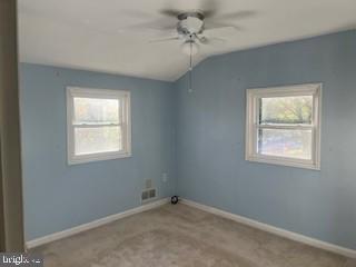 2746 Moorgate Road Baltimore, MD 21222 - Photo 7 of 14 a view of an empty room with a window