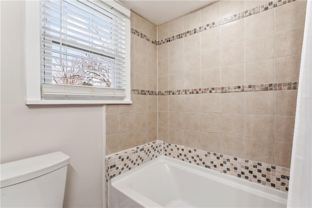 951 Shenango Road Beaver Falls, PA 15010 - Photo 20 of 42 a bathroom with a bathtub and shower