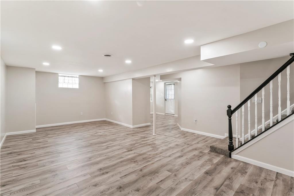 951 Shenango Road Beaver Falls, PA 15010 - Photo 21 of 42 a view of an empty room with wooden floor
