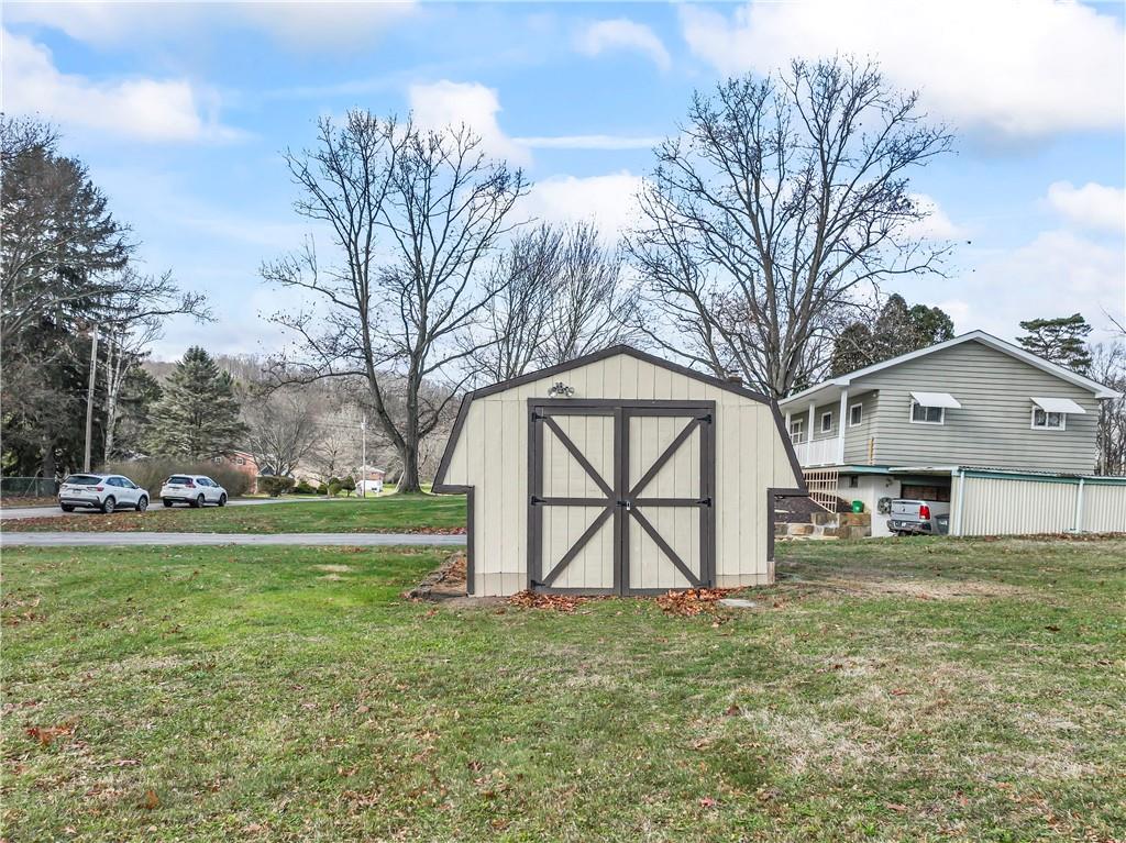 951 Shenango Road Beaver Falls, PA 15010 - Photo 35 of 42 a view of a house with backyard and tree