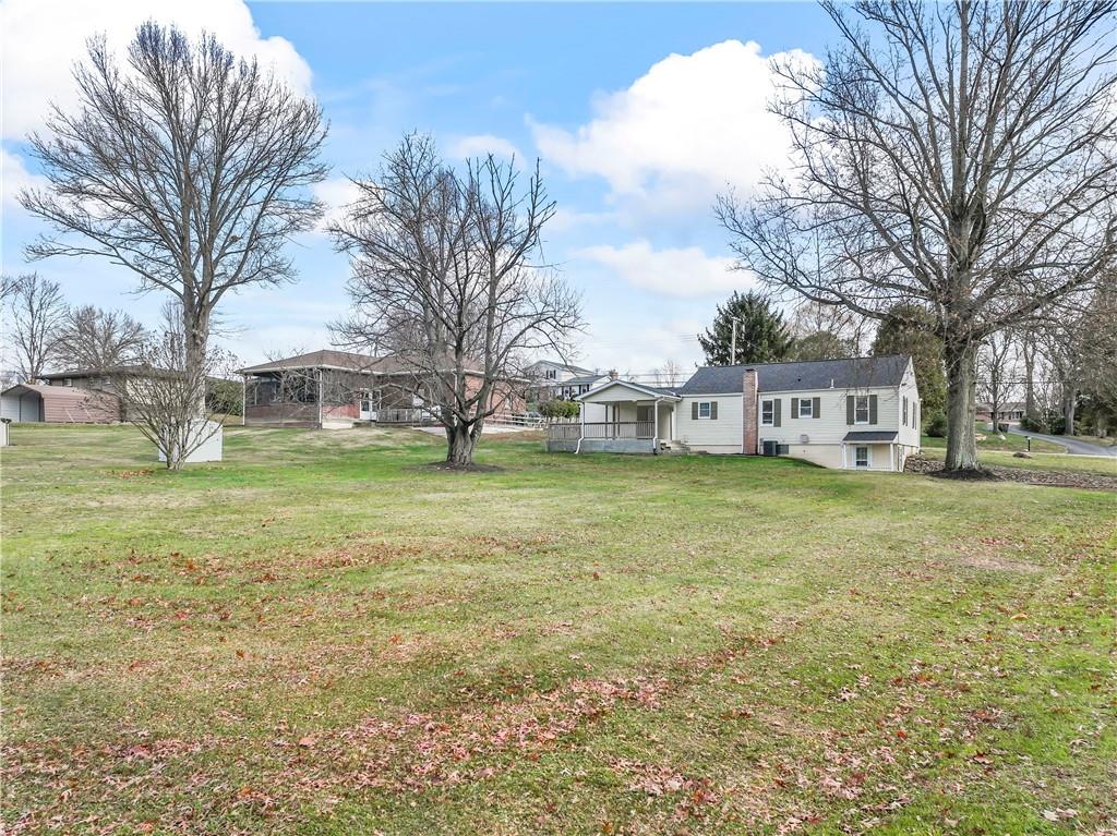 951 Shenango Road Beaver Falls, PA 15010 - Photo 36 of 42 a front view of house with garden