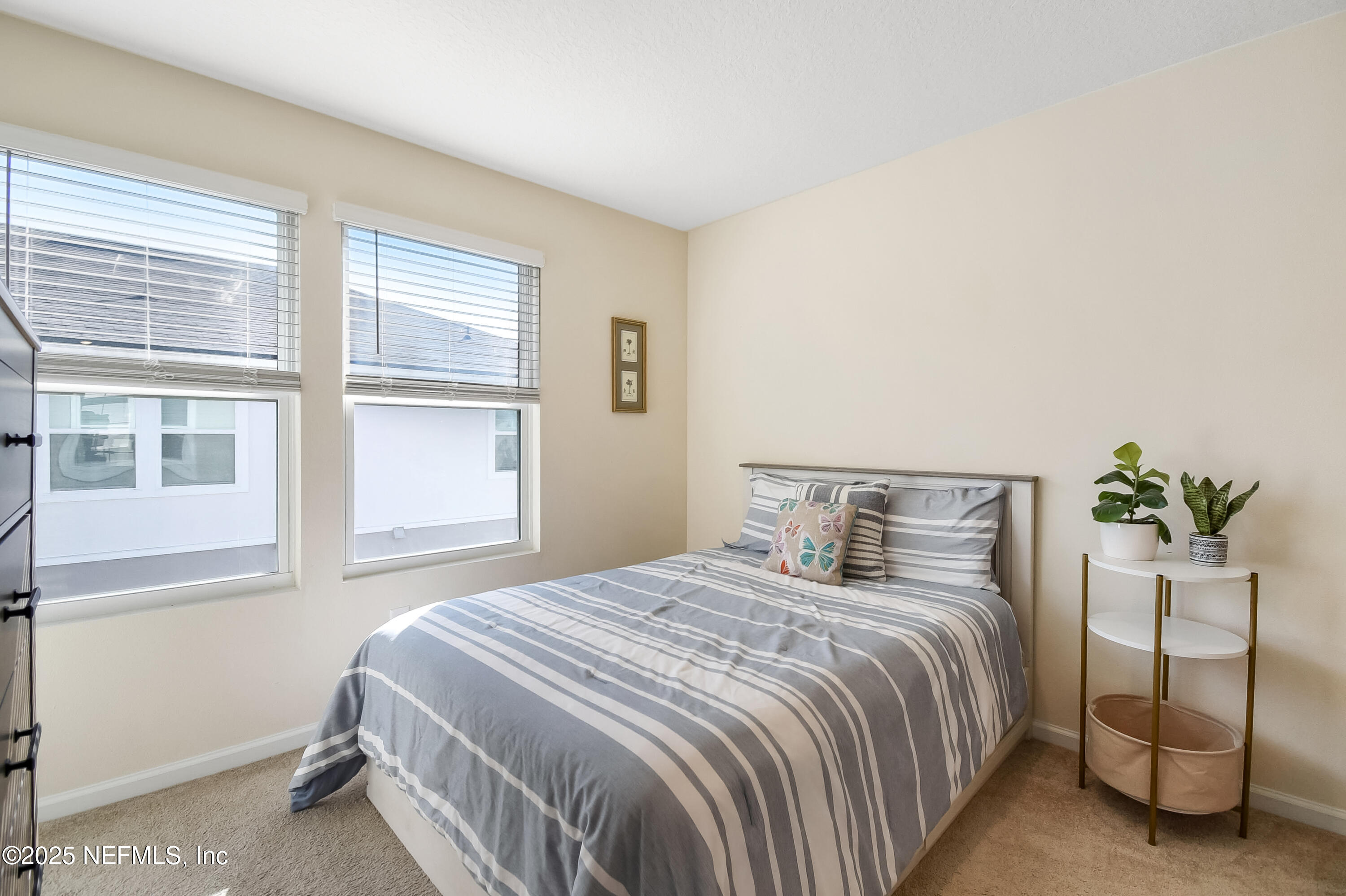 94 Red House Cir Street St. Augustine, FL 32084 - Photo 13 of 28 a bedroom with a bed and window