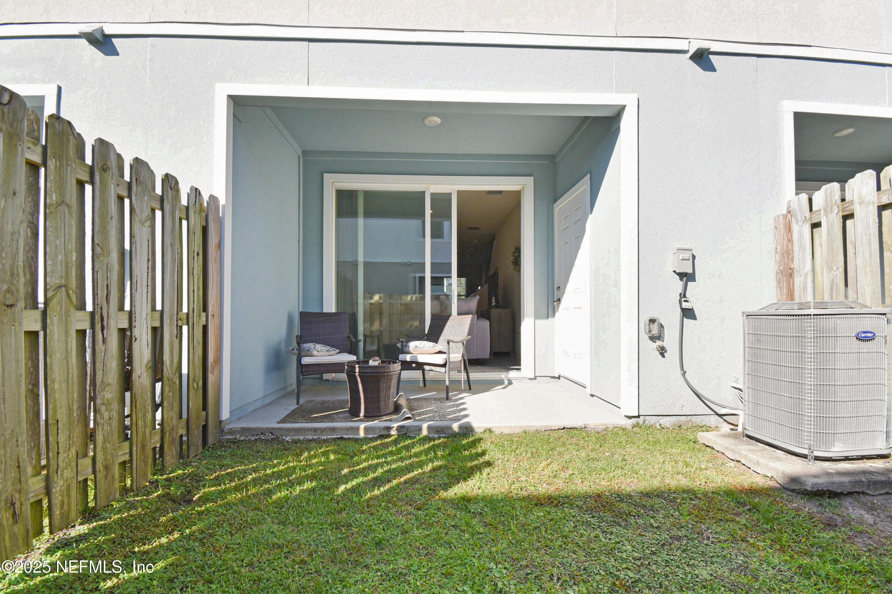94 Red House Cir Street St. Augustine, FL 32084 - Photo 26 of 28 a view of house with backyard and outdoor seating