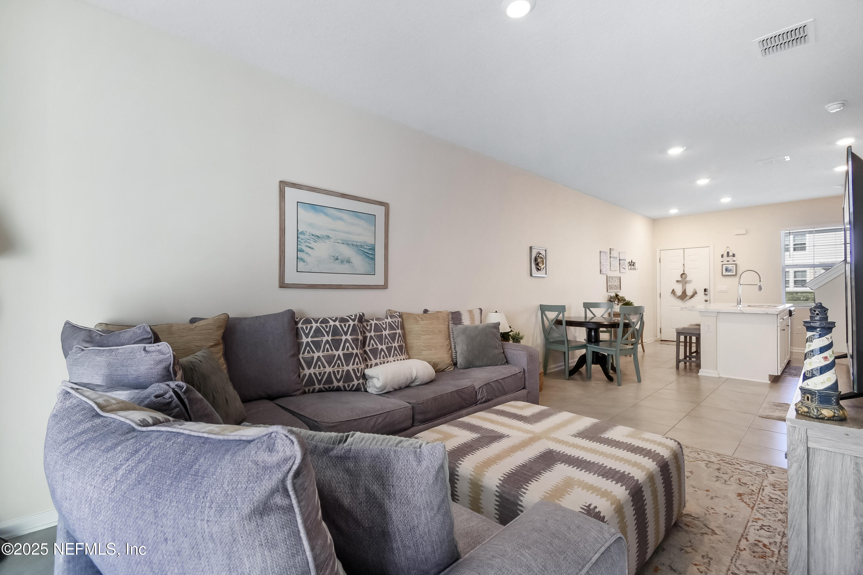 94 Red House Cir Street St. Augustine, FL 32084 - Photo 7 of 28 a living room with furniture and a table