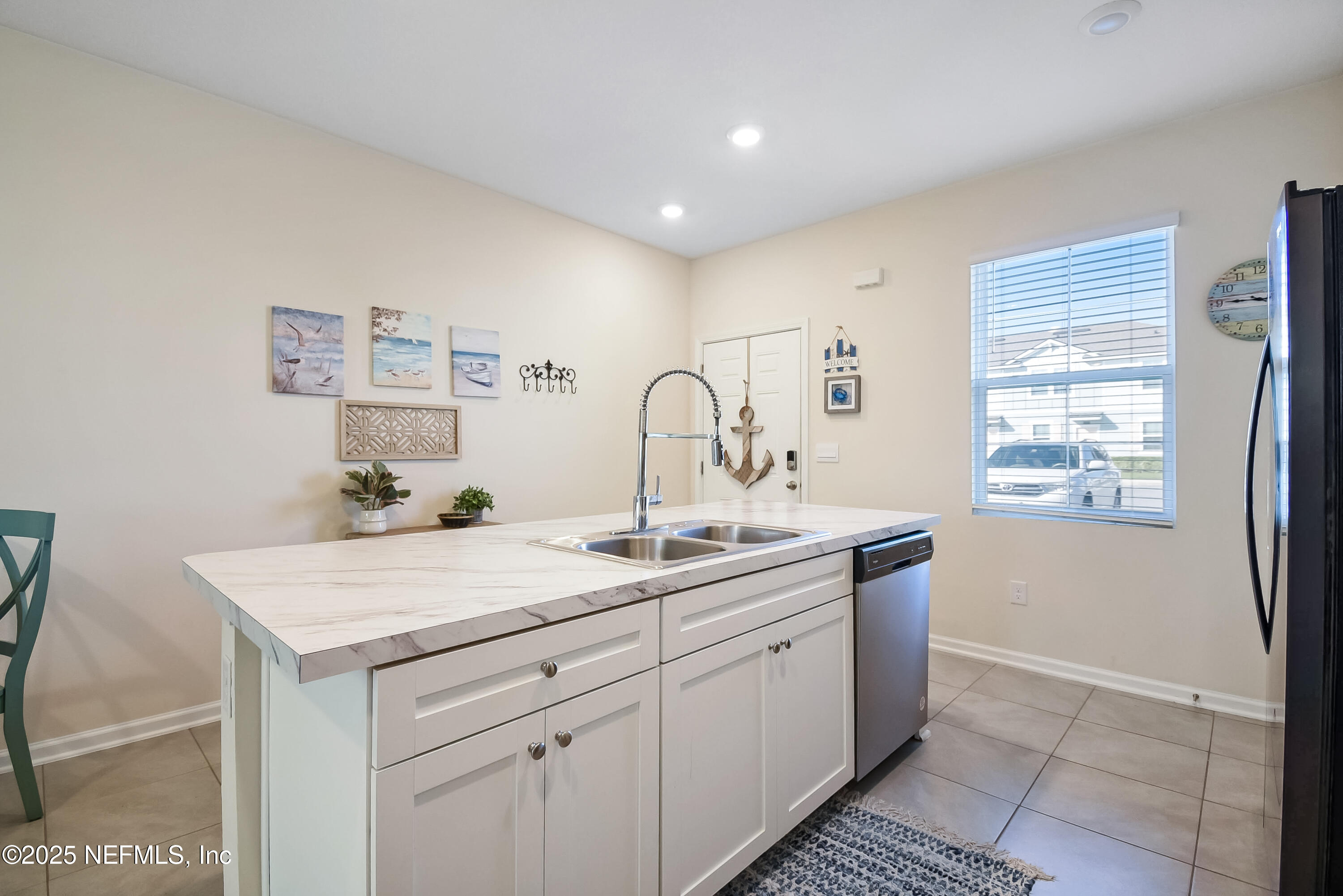 94 Red House Cir Street St. Augustine, FL 32084 - Photo 9 of 28 a kitchen with a sink and cabinets
