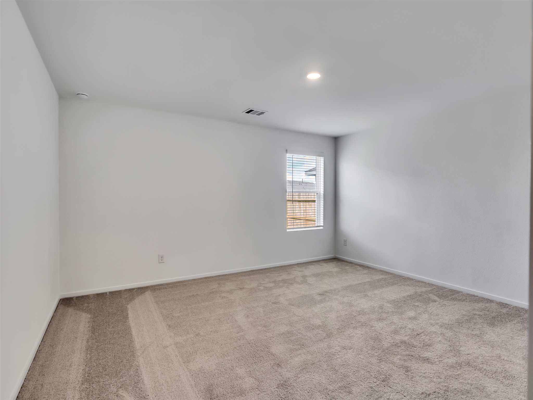3041 Colusa Rdg Drive Katy, TX 77493 - Photo 10 of 26 an empty room with windows