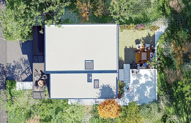 a living room with furniture tv and a large window