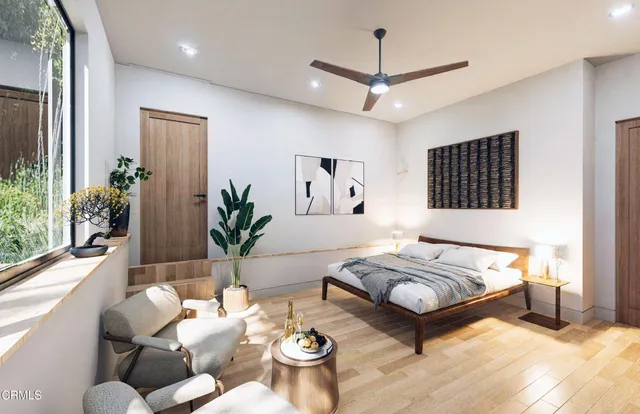 a large kitchen with a table and chairs in it