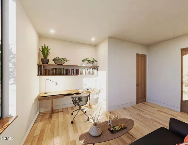 a bathroom with a toilet a sink and a mirror