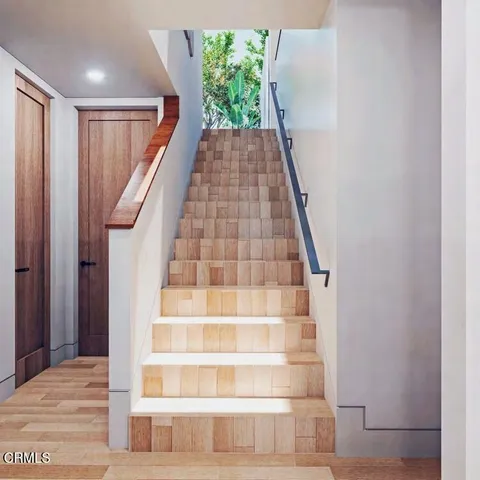 a very nice looking living room with a large window