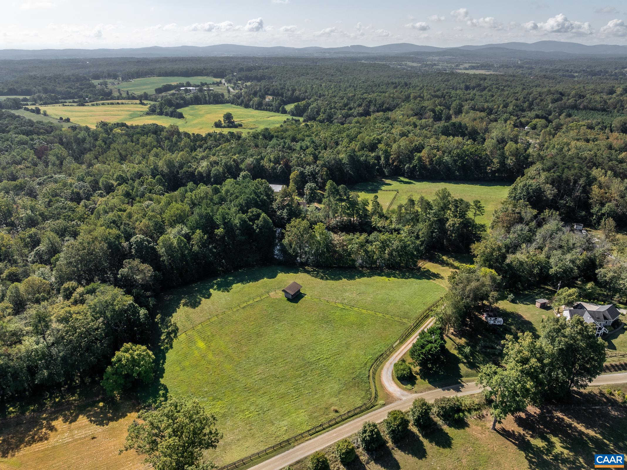 324 Longshot Lane Rochelle, VA 22738 - Photo 54 of 61 an aerial view of a residential houses with outdoor space and trees all around