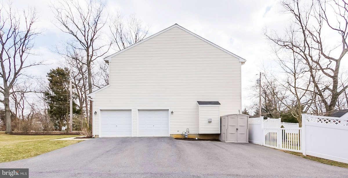 5006 Montgomery Road Ellicott City, MD 21043 - Photo 2 of 30 Over-size 2-Car SIDE LOAD Garage