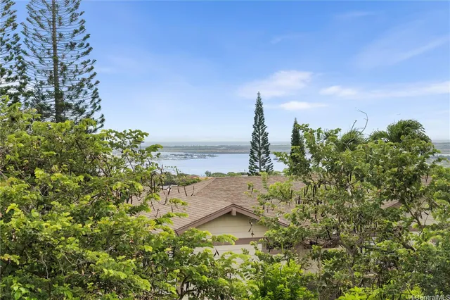 a view of a lake with a garden