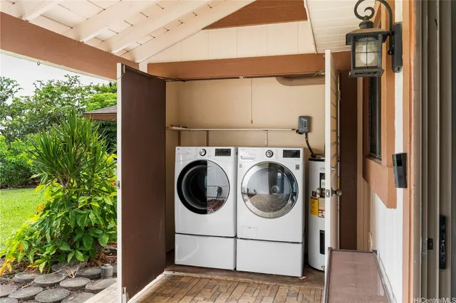 a utility room with dryer and washer