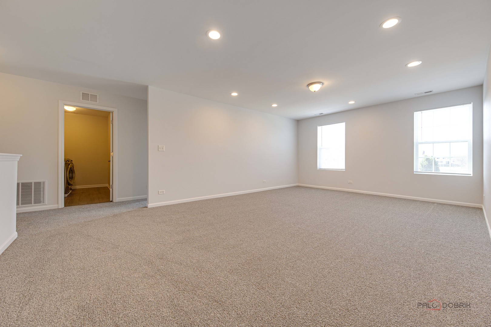 1385 Broadland Drive Pingree Grove, IL 60140 - Photo 21 of 40 an empty room with windows and closet