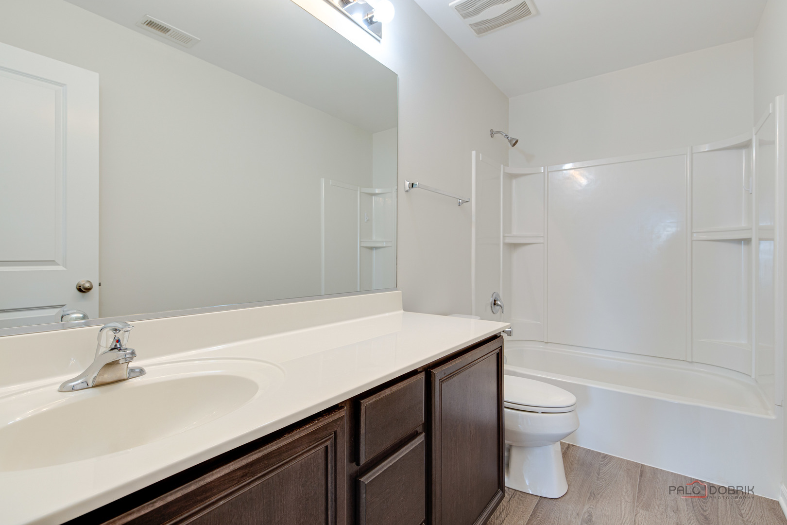 1385 Broadland Drive Pingree Grove, IL 60140 - Photo 26 of 40 a bathroom with a sink a toilet and shower