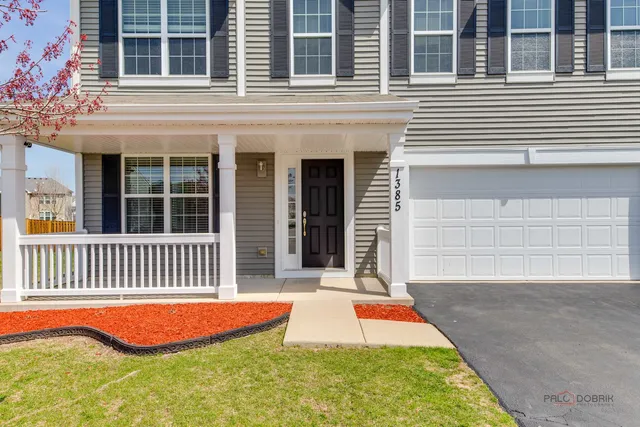 a front view of a house having yard