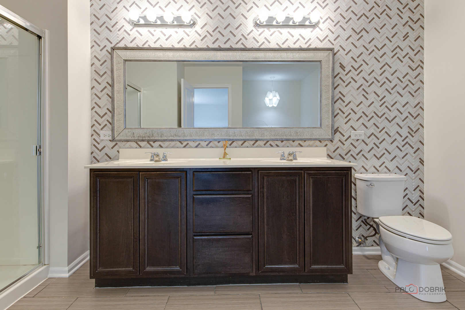 1385 Broadland Drive Pingree Grove, IL 60140 - Photo 33 of 40 a bathroom with a sink and a mirror