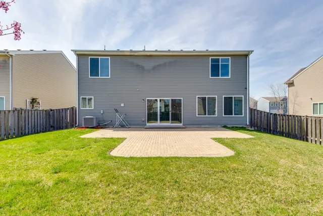 a swimming pool with wooden fence