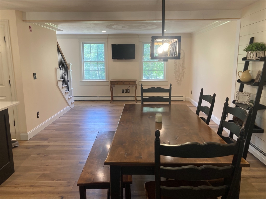 337 Mason Rd Extension Dudley, MA 01571 - Photo 12 of 31 a view of a dining room with furniture