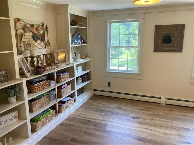 a view of a livingroom with shelves