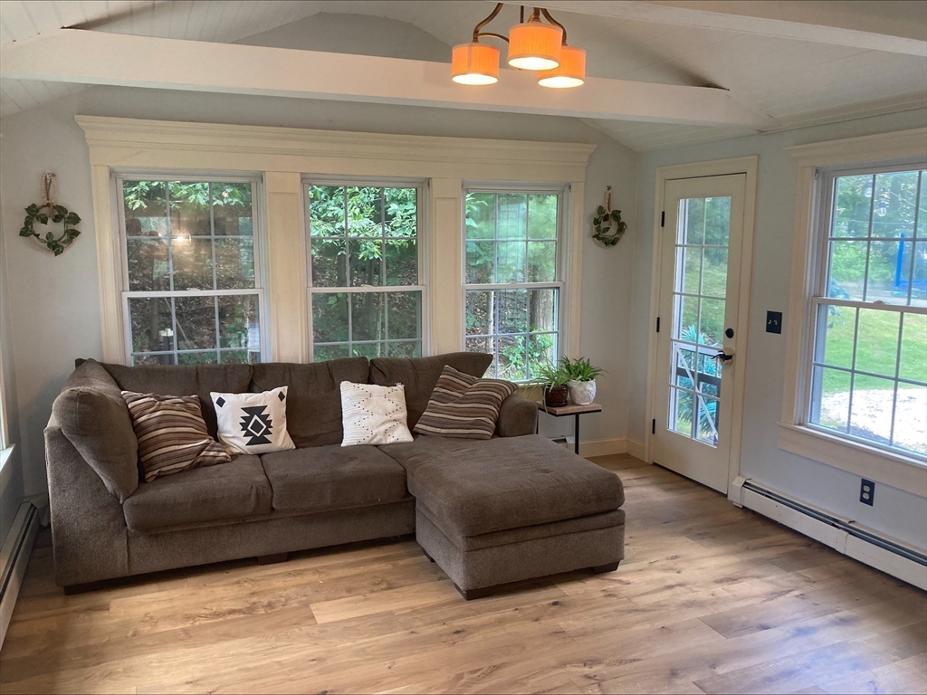337 Mason Rd Extension Dudley, MA 01571 - Photo 17 of 31 a living room with furniture and a large window