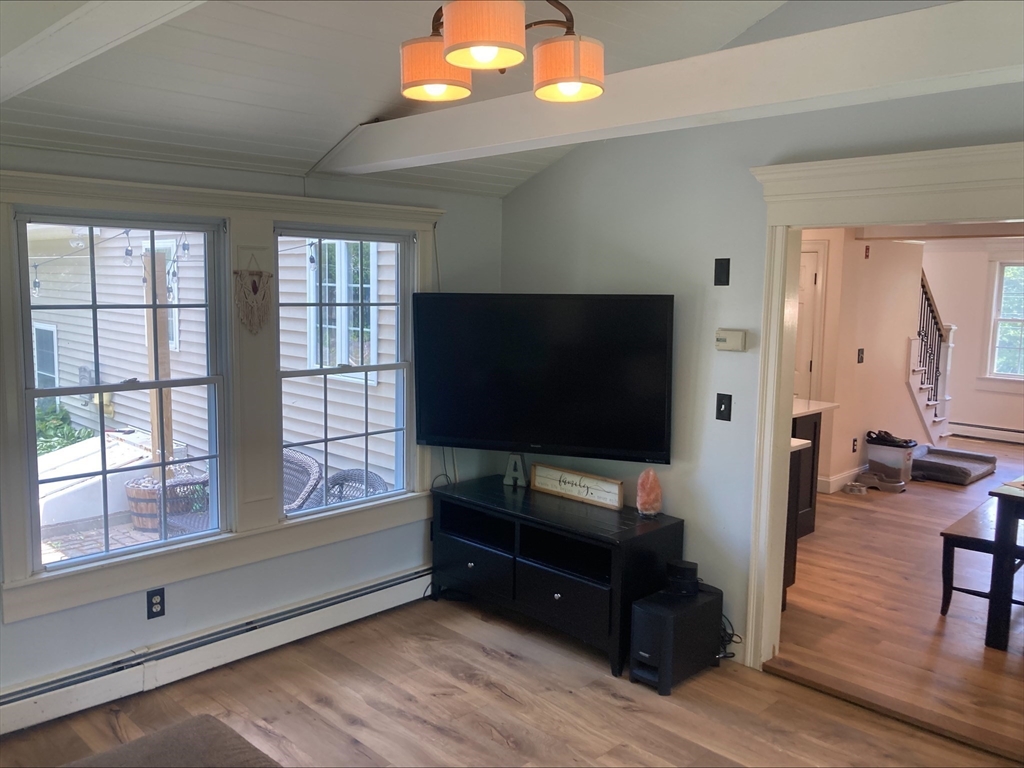 337 Mason Rd Extension Dudley, MA 01571 - Photo 18 of 31 a living room with furniture and a flat screen tv