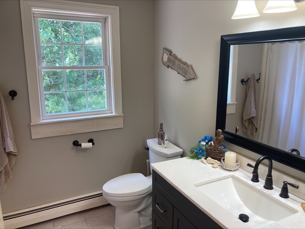337 Mason Rd Extension Dudley, MA 01571 - Photo 26 of 31 a bathroom with a sink and a toilet