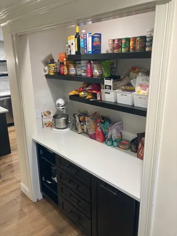 a room with lots of different colored cloths