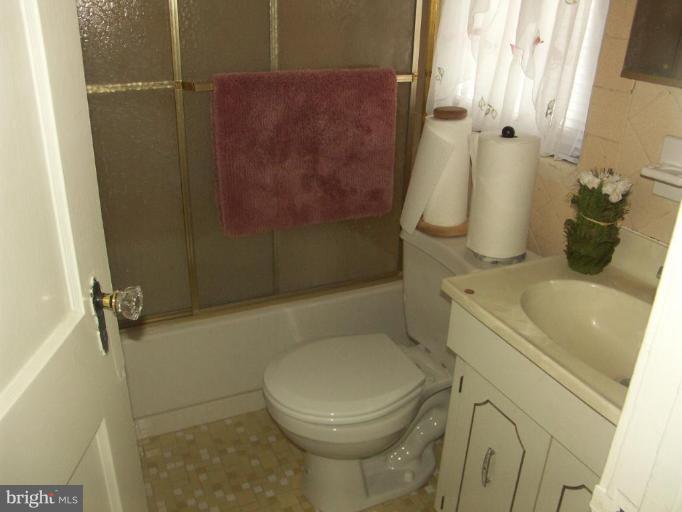 3601 28th Street Northeast Washington, DC 20018 - Photo 12 of 24 a bathroom with a sink and toilet