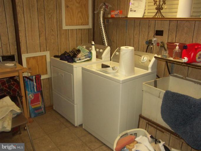 3601 28th Street Northeast Washington, DC 20018 - Photo 14 of 24 a bathroom with a sink a toilet and a tub