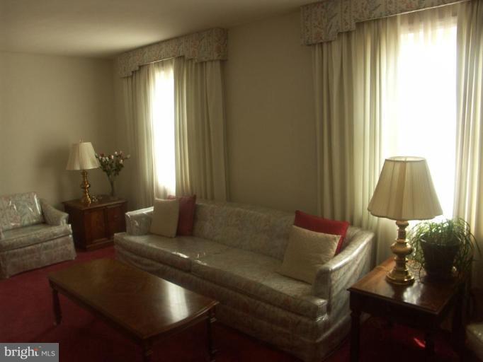 3601 28th Street Northeast Washington, DC 20018 - Photo 9 of 24 a living room with furniture and a window
