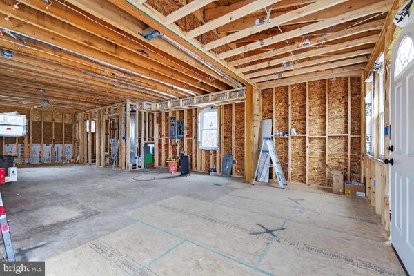 a view of a room with wooden walls
