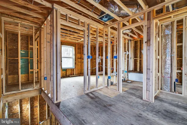 a view of an empty room with windows