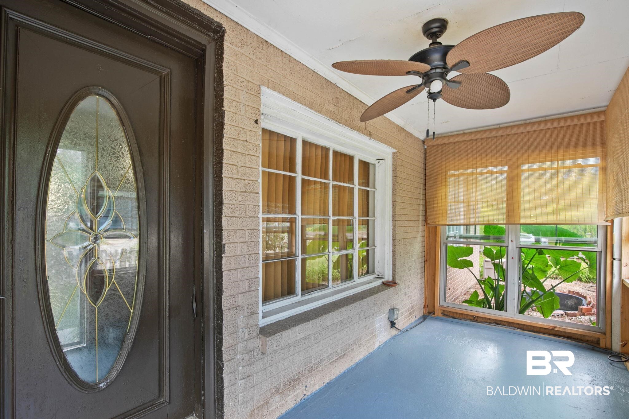 23240 County Road 47 Perdido, AL 36562 - Photo 4 of 29 Property entrance featuring brick siding, a sunroom, and french doors