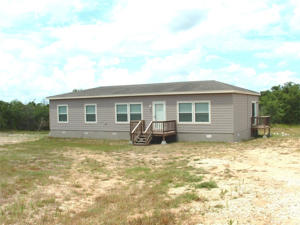a view of a house with a patio