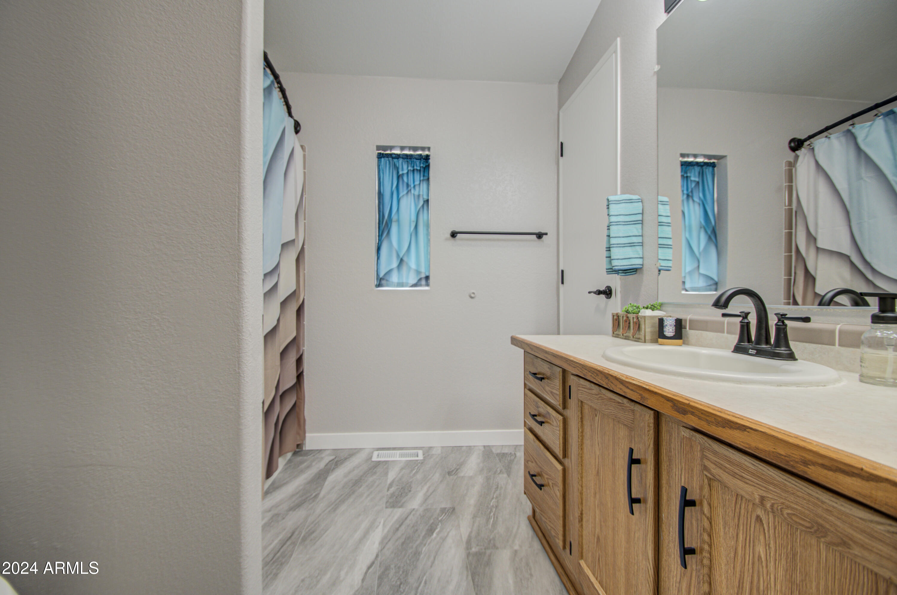2208 West Baseline Avenue, Unit 7 Apache Junction, AZ 85120 - Photo 17 of 38 Primary Bath 1